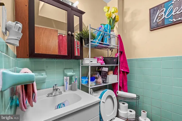 a bathroom with a sink and a toilet