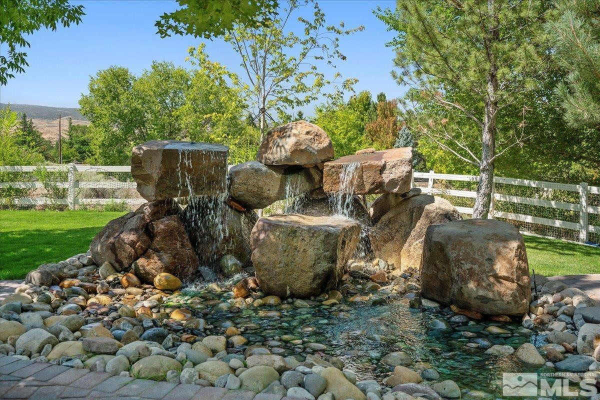 3255 Kinney Court Reno, NV 89511 - Photo 34 of 38 a view of a backyard with plants and trees