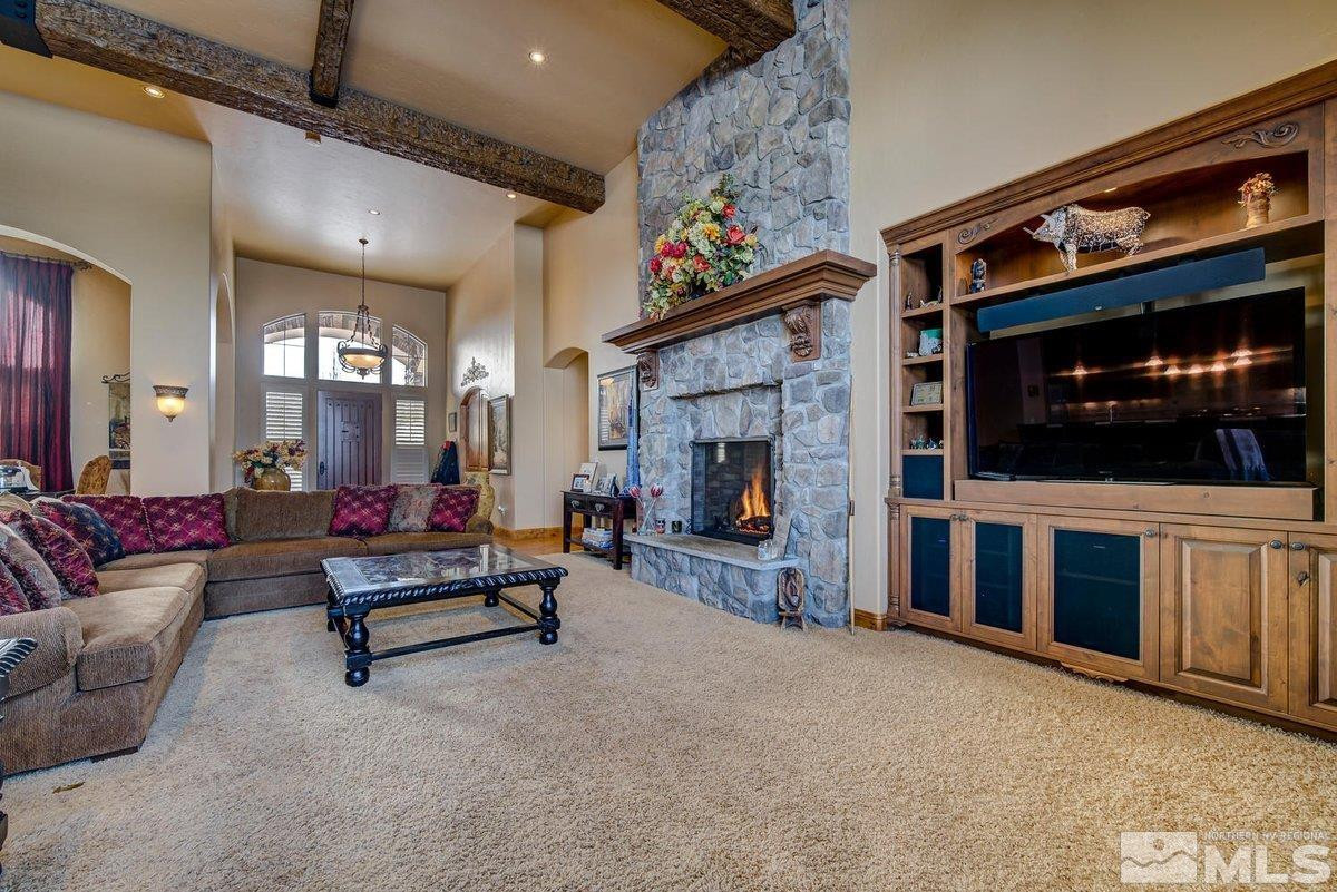 3255 Kinney Court Reno, NV 89511 - Photo 10 of 38 a living room with furniture and a flat screen tv