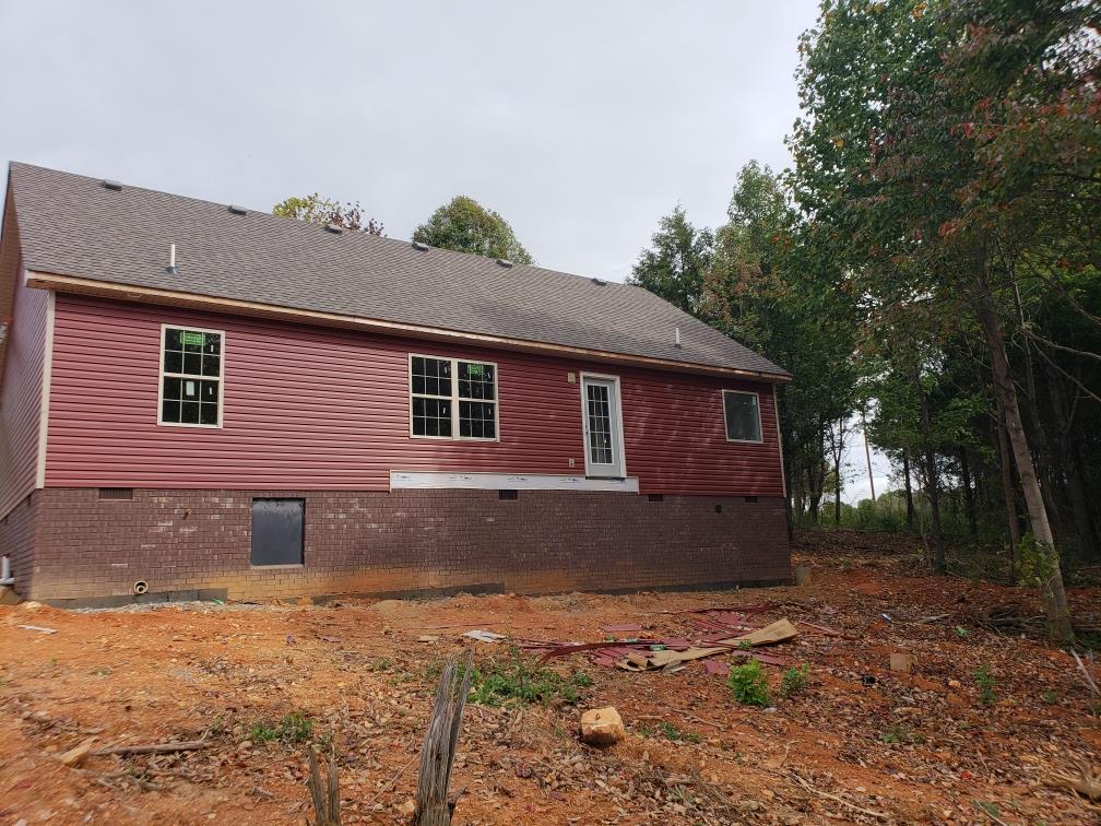 114 East Carter Road Portland, TN 37148 - Photo 2 of 3 a front view of a house with a yard