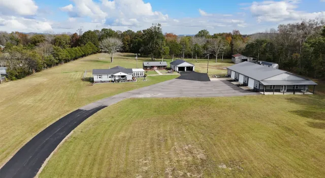 a view of swimming pool with seating area