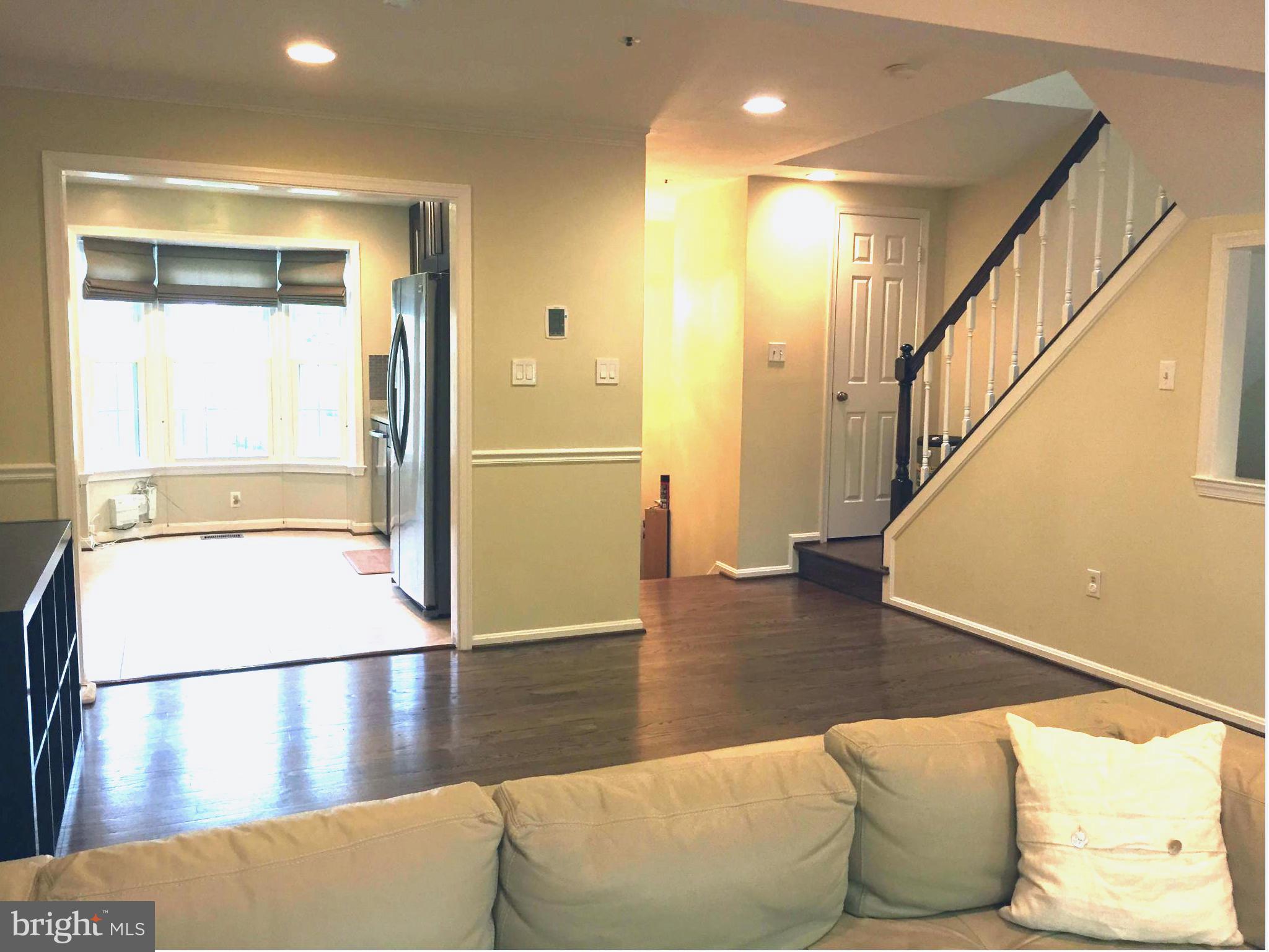 2617 Chivalry Court Silver Spring, MD 20902 - Photo 5 of 20 a view of a living room with a couch
