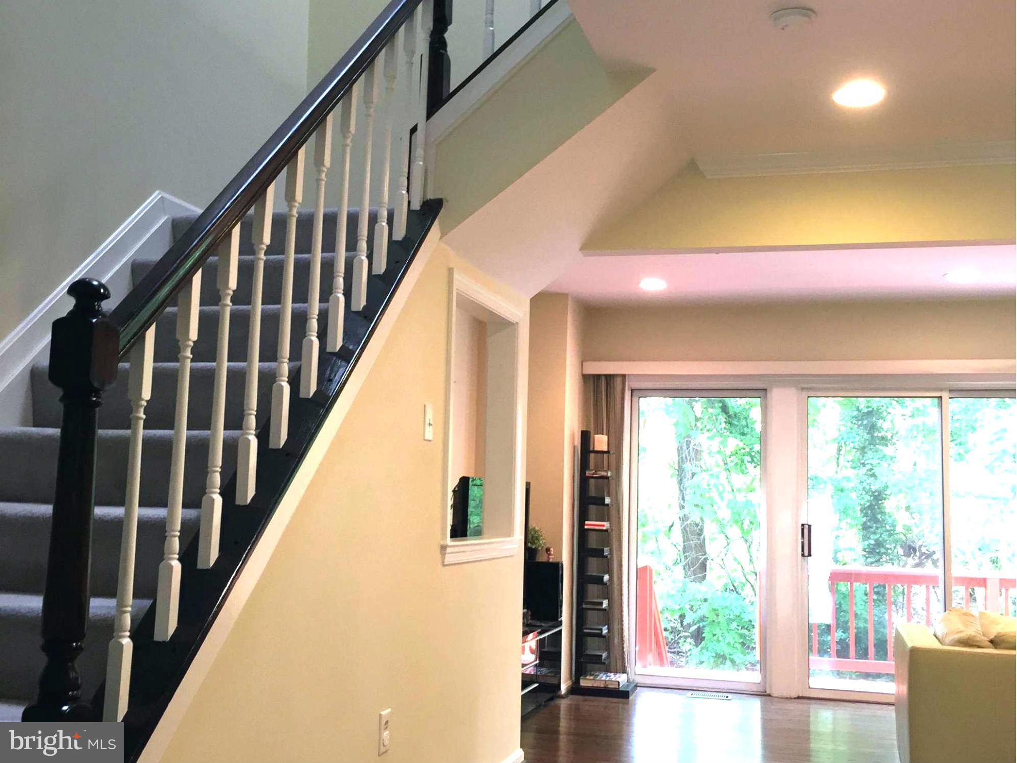 2617 Chivalry Court Silver Spring, MD 20902 - Photo 6 of 20 a view of balcony with wooden floor and windows
