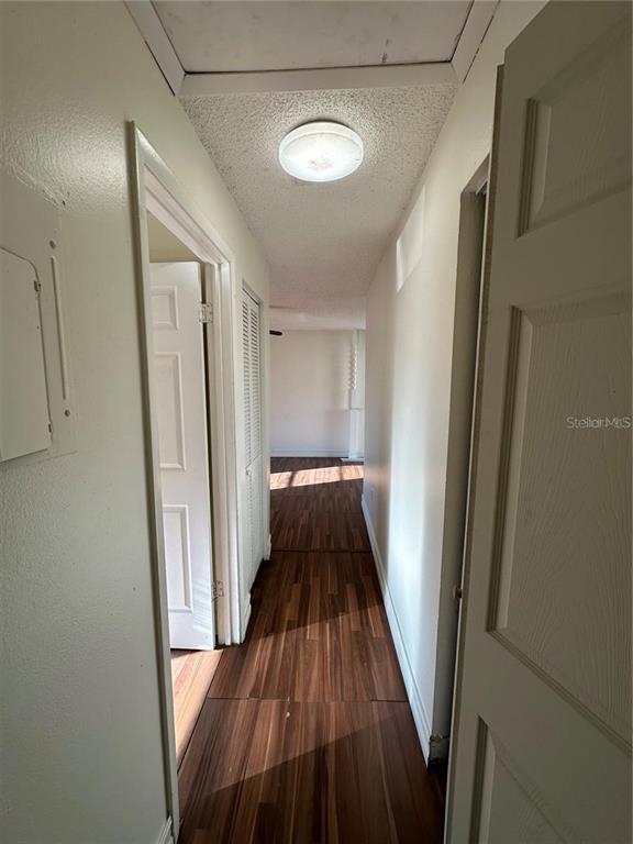 1918 Honour Road, Unit 4 Orlando, FL 32839 - Photo 9 of 17 a view of a hallway view with wooden floor and staircase