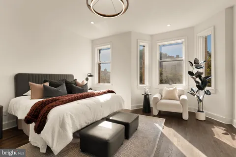 a bed room with bed and a couch