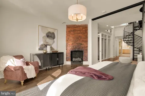 a kitchen with sink and cabinets