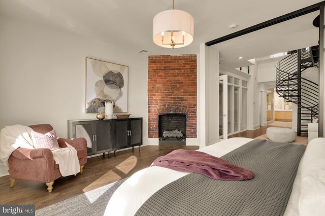 a kitchen with sink and cabinets
