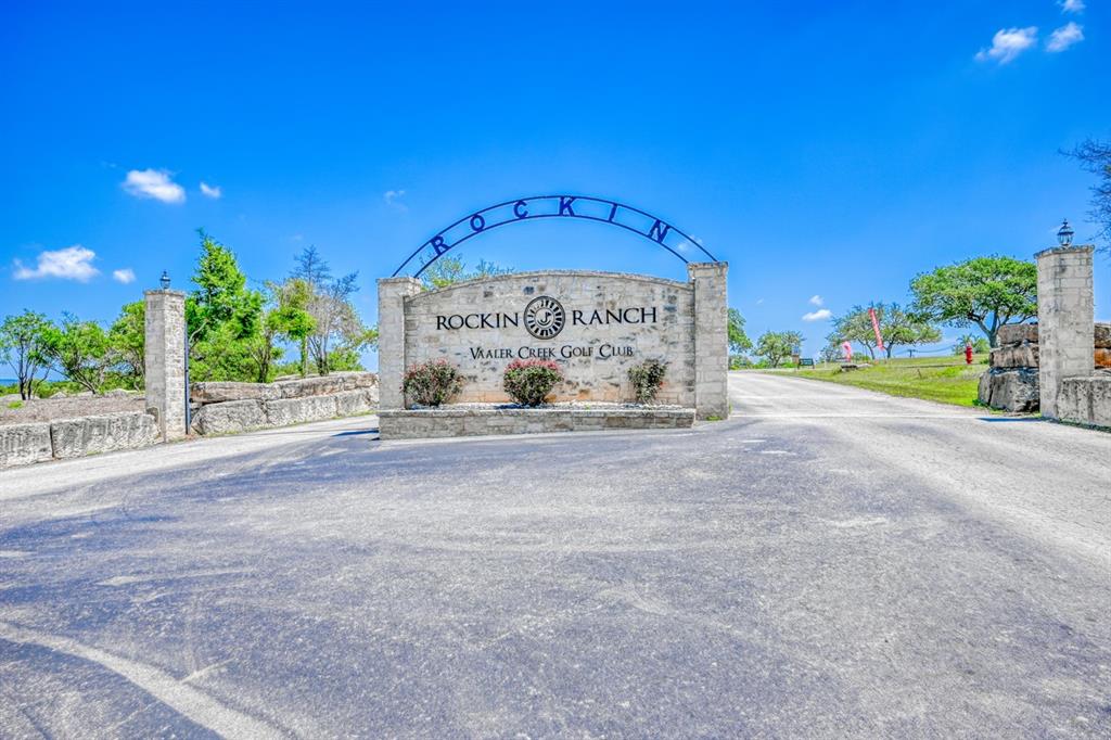 327 John Price Blanco, TX 78606 - Photo 2 of 12 a view of a garden with a bench