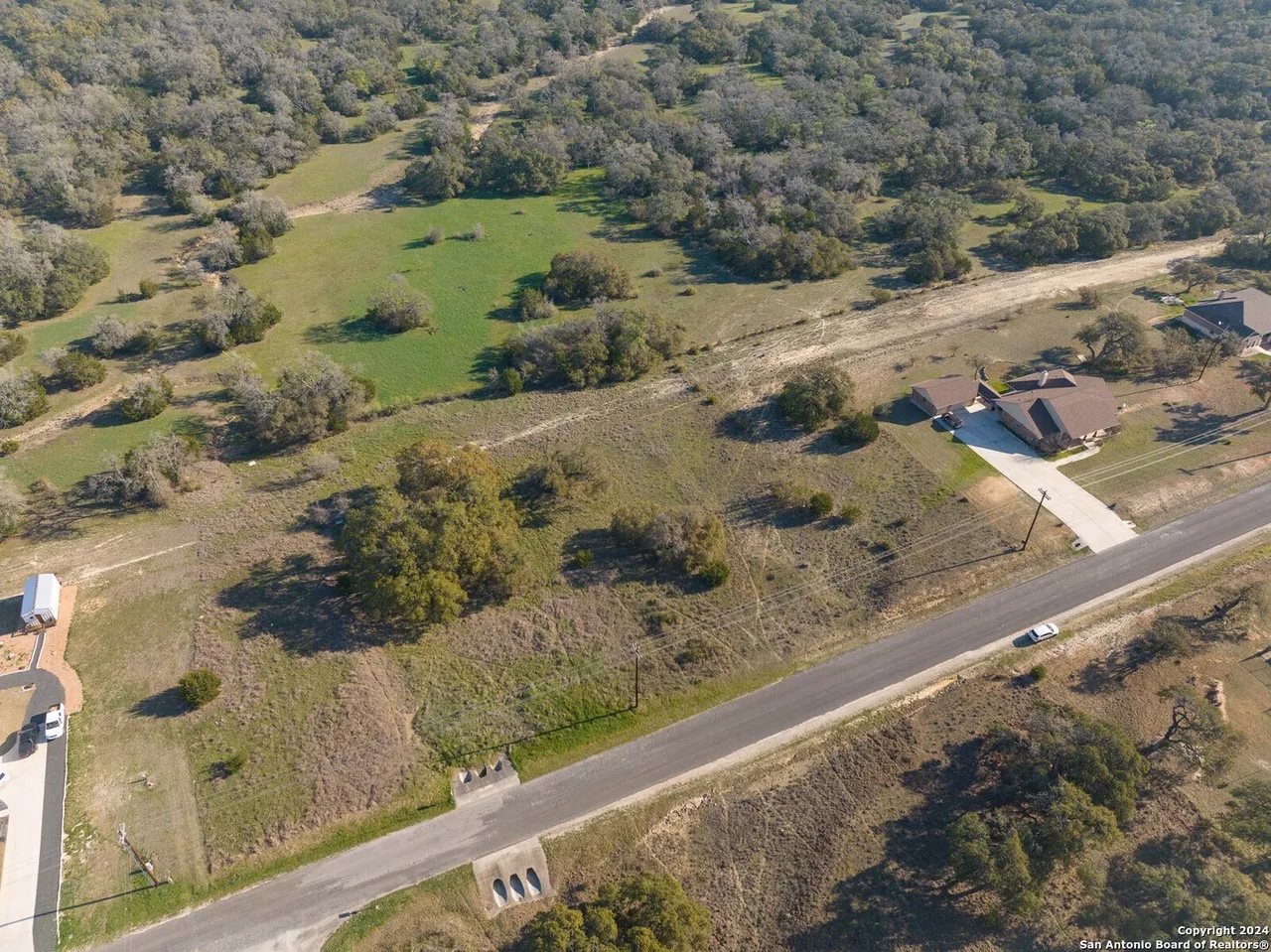 327 John Price Blanco, TX 78606 - Photo 7 of 12 Aerial view of property and surrounding area