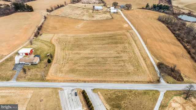 a living room with a bed