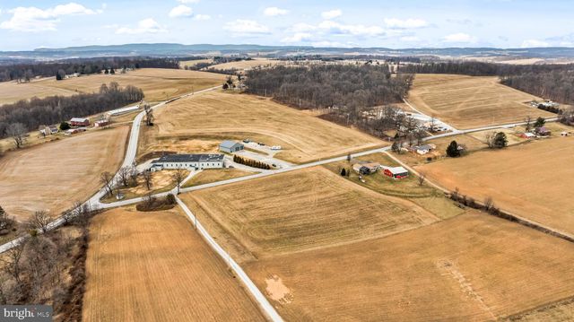 a view of a swimming pool with an ocean view