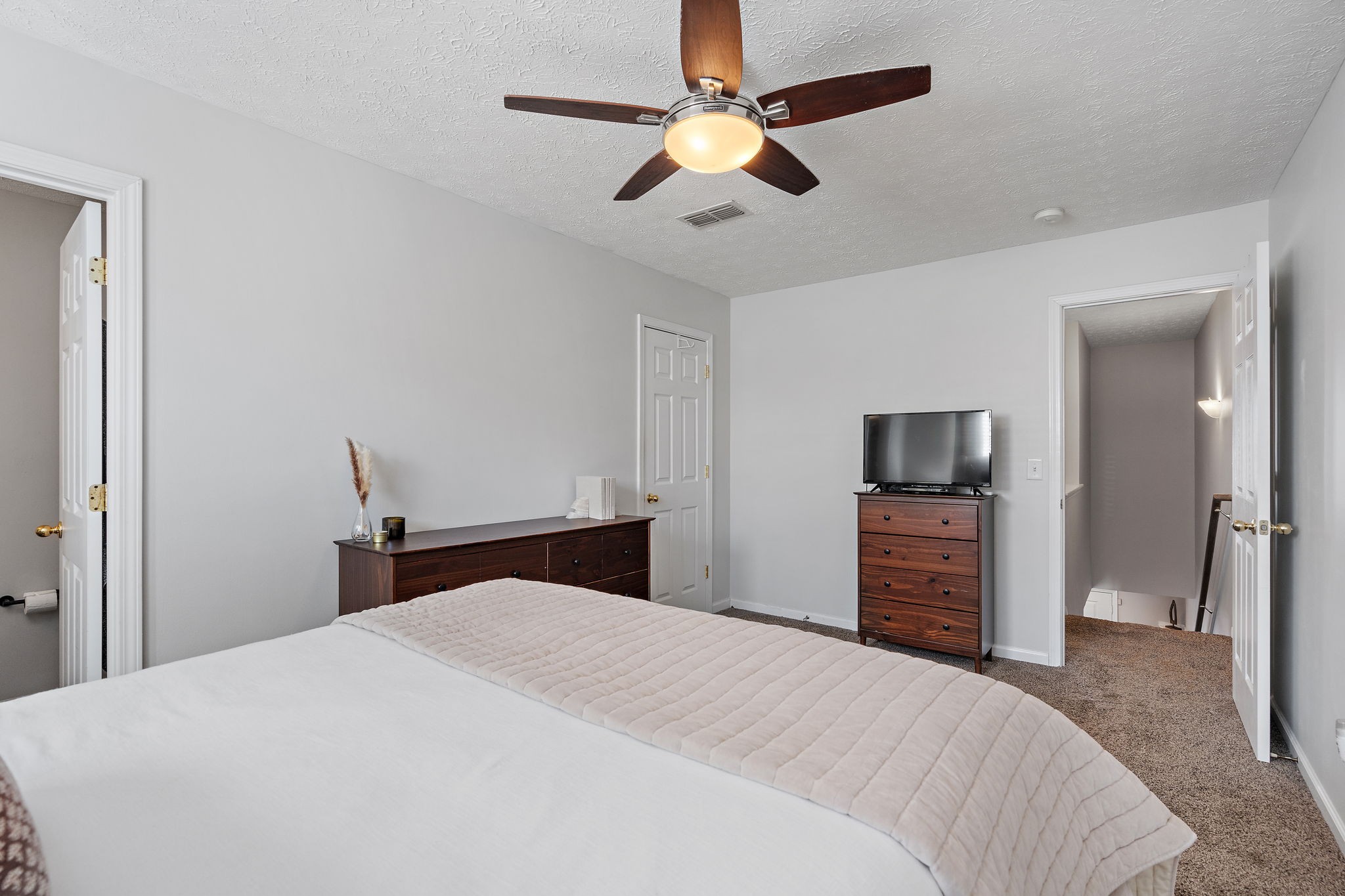 415 Shadow Glen Drive Nashville, TN 37211 - Photo 20 of 27 a bedroom with a bed and a tv