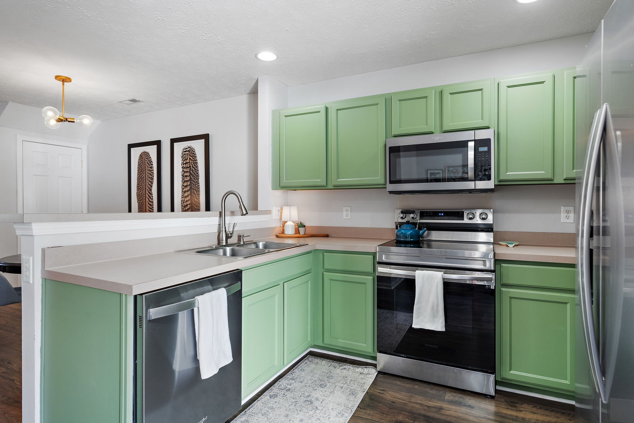 415 Shadow Glen Drive Nashville, TN 37211 - Photo 6 of 27 a kitchen with a sink and a microwave
