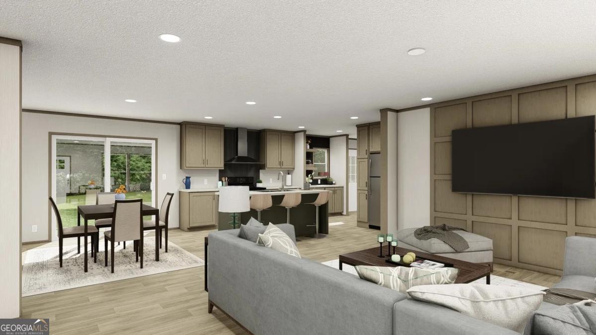 7463 Yukon Road Talking Rock, GA 30175 - Photo 3 of 5 a living room with furniture and a flat screen tv