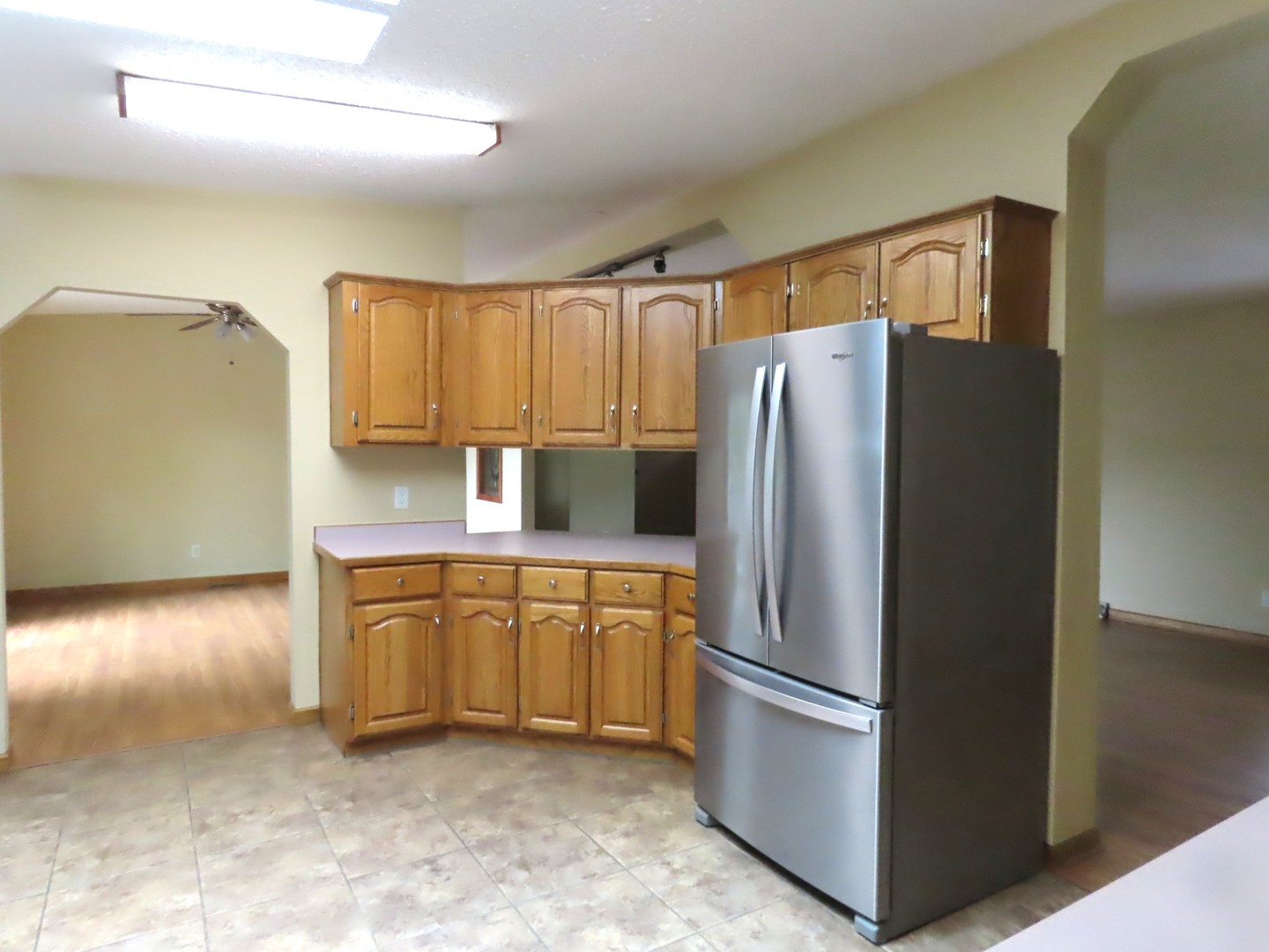 2968 North 2659th Road Seneca, IL 61360 - Photo 3 of 20 a kitchen with stainless steel appliances granite countertop a refrigerator a stove and a sink