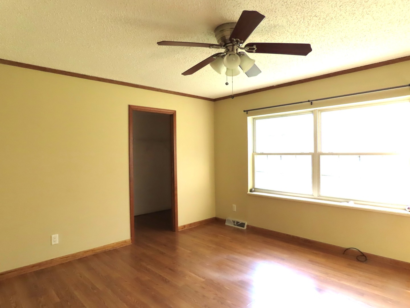 2968 North 2659th Road Seneca, IL 61360 - Photo 6 of 20 a view of an empty room with a window