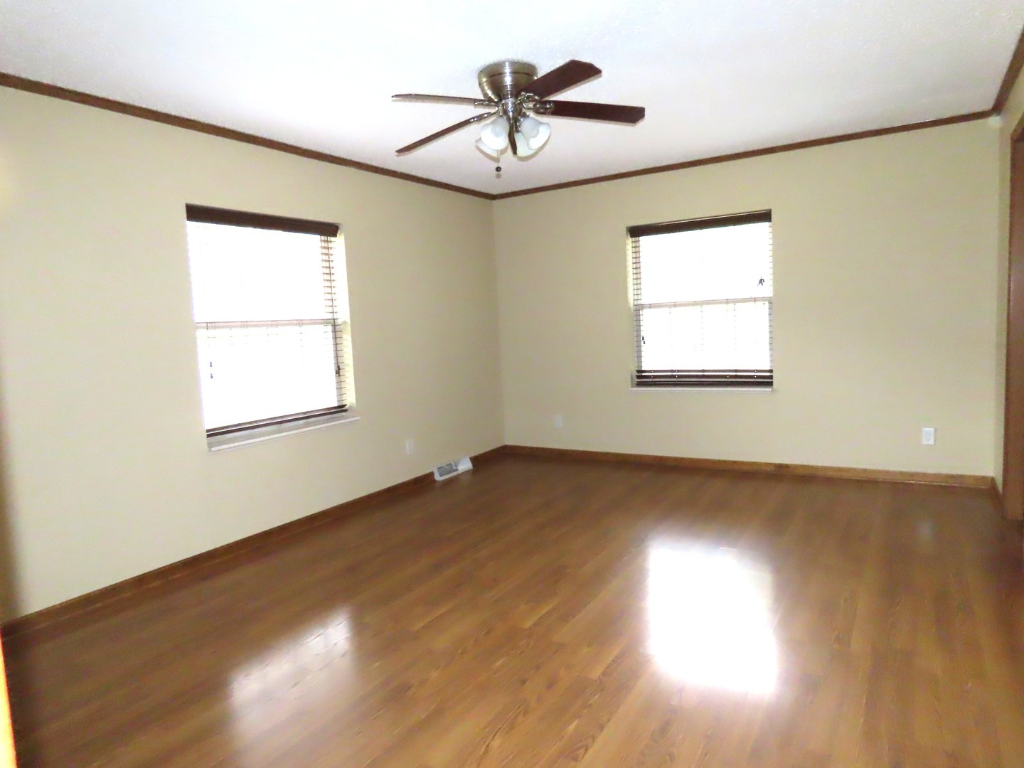 2968 North 2659th Road Seneca, IL 61360 - Photo 7 of 20 a view of a livingroom with a window and wooden floor