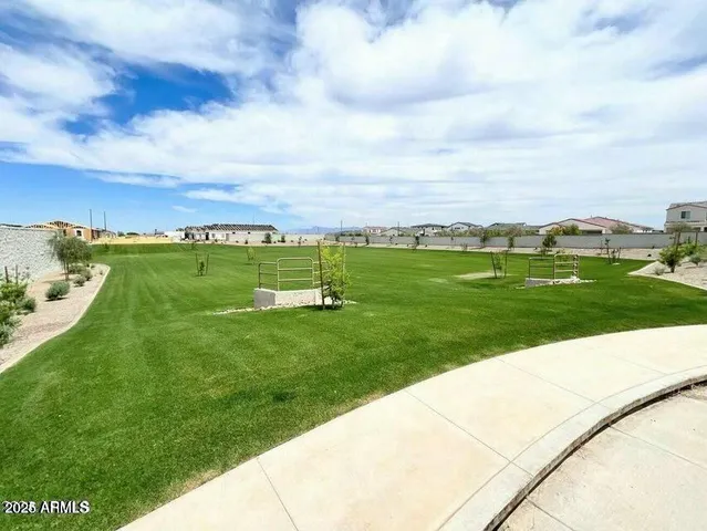 a view of a golf course with a lake