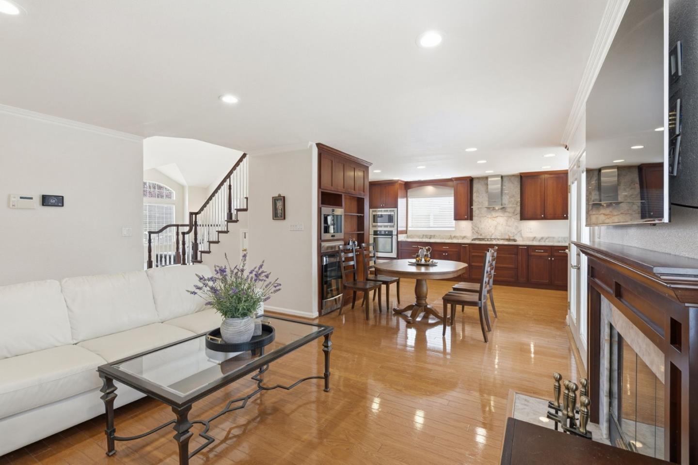 35 Sierra Ridge Court Danville, CA 94506 - Photo 11 of 37 a living room with furniture and kitchen view