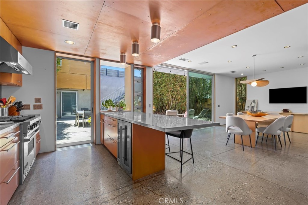 604 33rd Street Manhattan Beach, CA 90266 - Photo 13 of 46 a large kitchen with a table and chairs