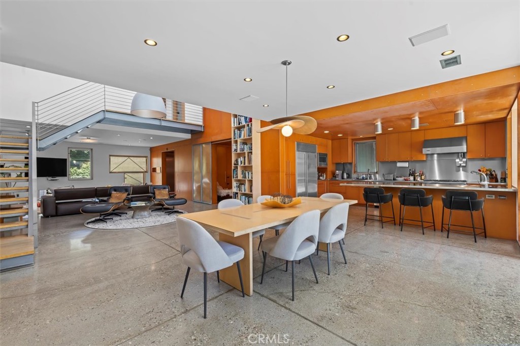 604 33rd Street Manhattan Beach, CA 90266 - Photo 19 of 46 a view of a dining area with furniture and a chandelier