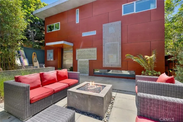 a building outdoor space with patio furniture