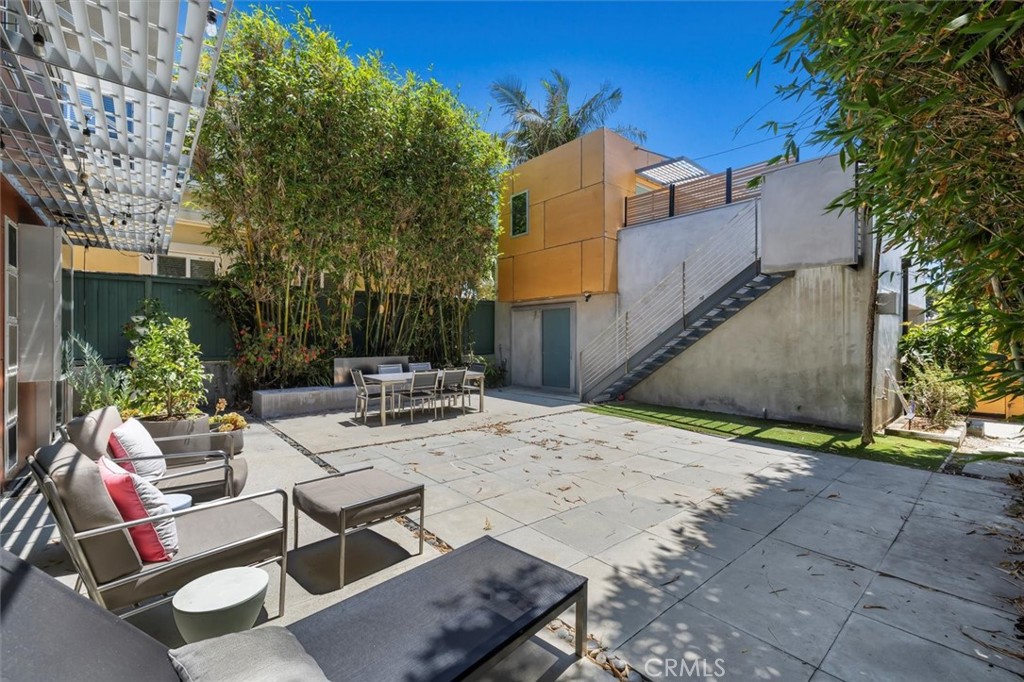 604 33rd Street Manhattan Beach, CA 90266 - Photo 40 of 46 a view of backyard with outdoor seating and trees