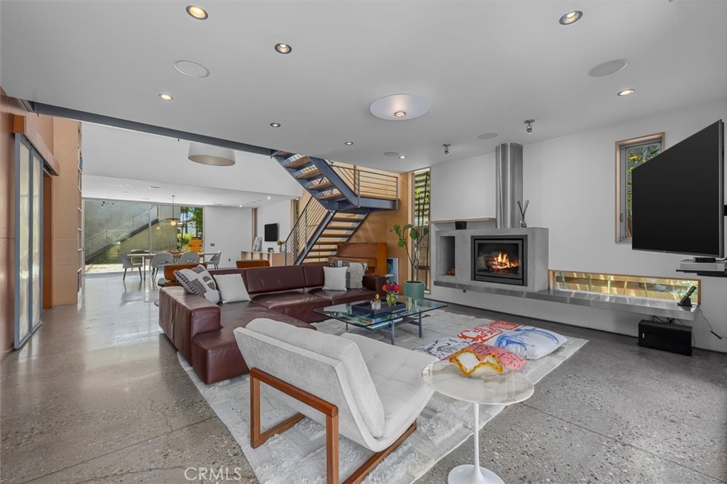 604 33rd Street Manhattan Beach, CA 90266 - Photo 5 of 46 a living room with furniture and a flat screen tv