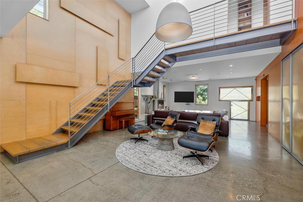 604 33rd Street Manhattan Beach, CA 90266 - Photo 8 of 46 a living room with furniture and a large window