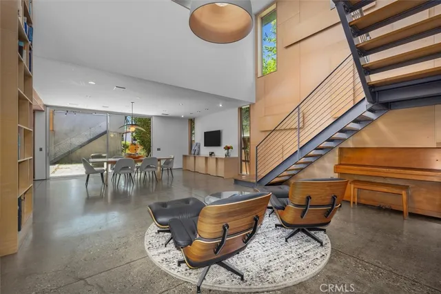 a room with lots of chairs and a table