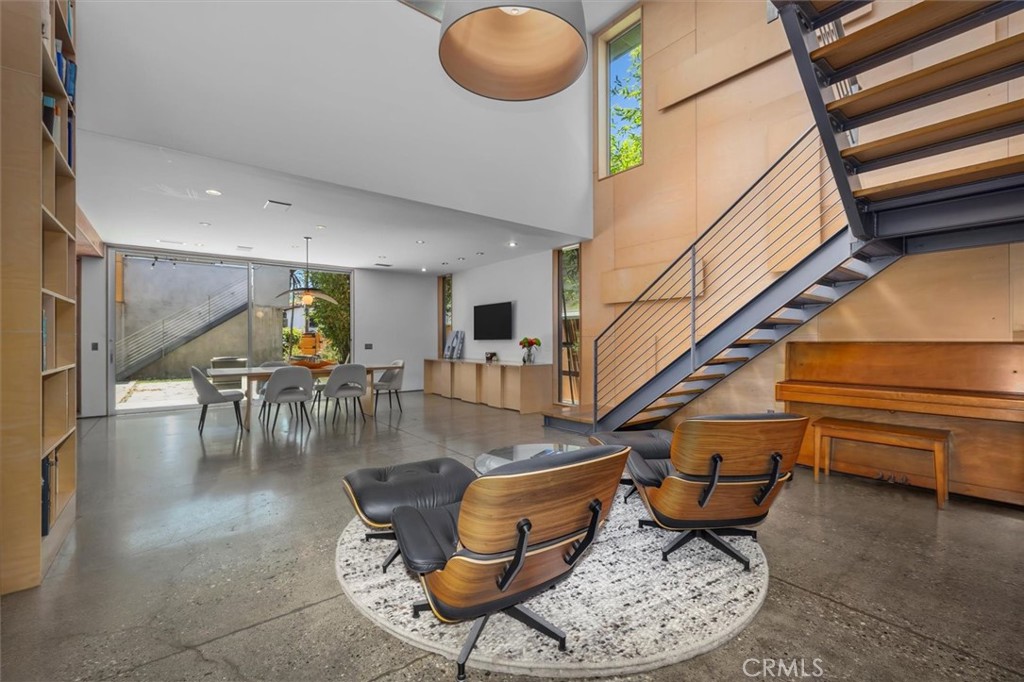 604 33rd Street Manhattan Beach, CA 90266 - Photo 9 of 46 a room with lots of chairs and a table