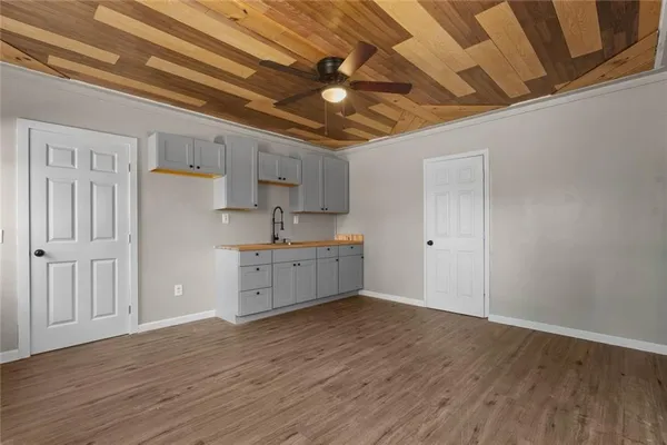 a kitchen with stainless steel appliances a refrigerator and a sink