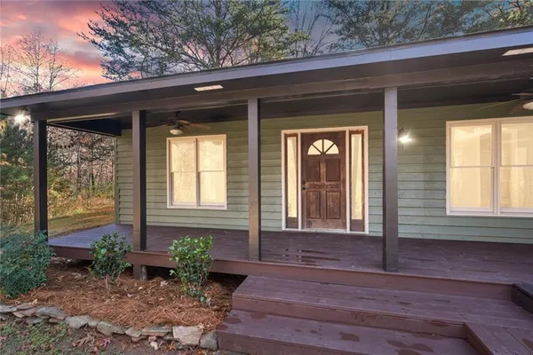 a front view of a house with porch