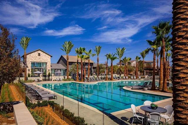 a view of swimming pool with outdoor seating