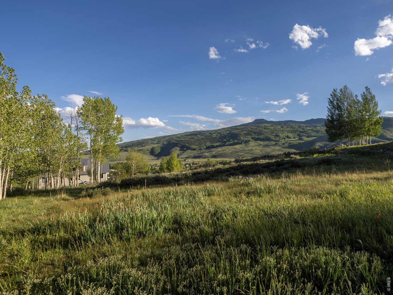 451 Zeligman Street Crested Butte, CO 81224 - Photo 3 of 16 a view of a lake in middle of a house