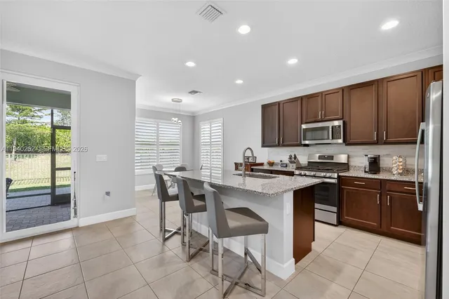 $415,000 | 16699 Southwest Osprey Falls Way, Port St. Lucie, FL 34987