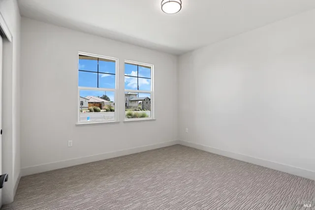 a view of an empty room with window