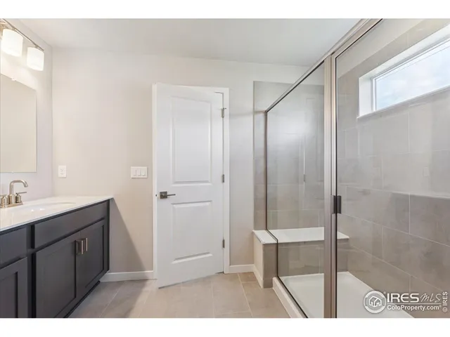 a bathroom with a sink a mirror and a toilet