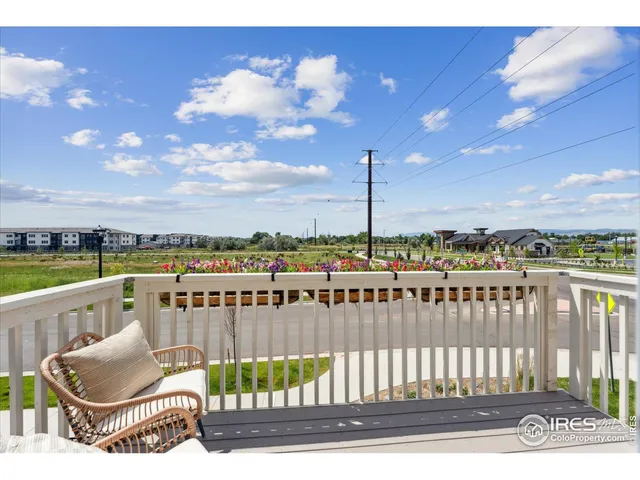 a view of a street from a balcony