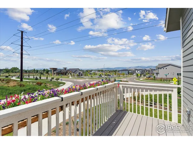 a bathroom with a sink a toilet a mirror and shower