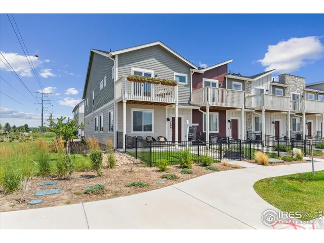 a front view of a building with street view