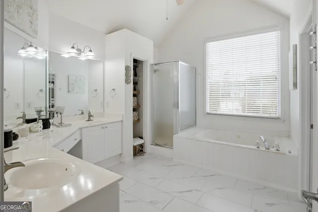 a white bath tub sitting next to a window