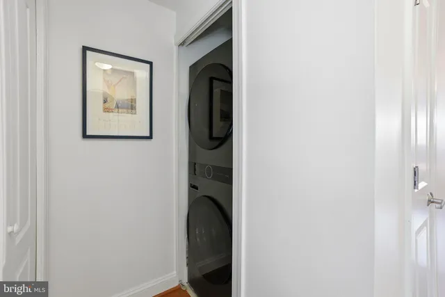 a view of a hallway with closet