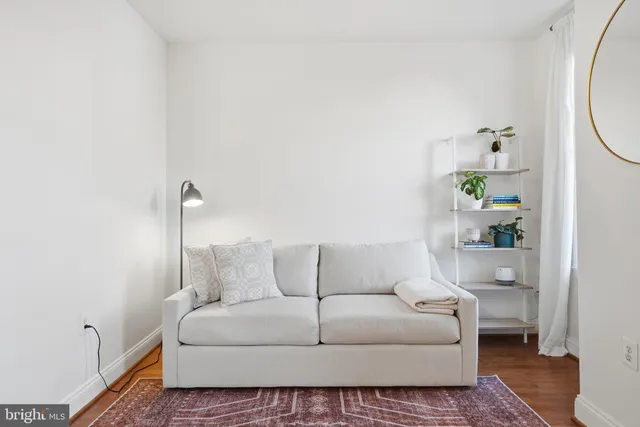 a living room with furniture and a couch