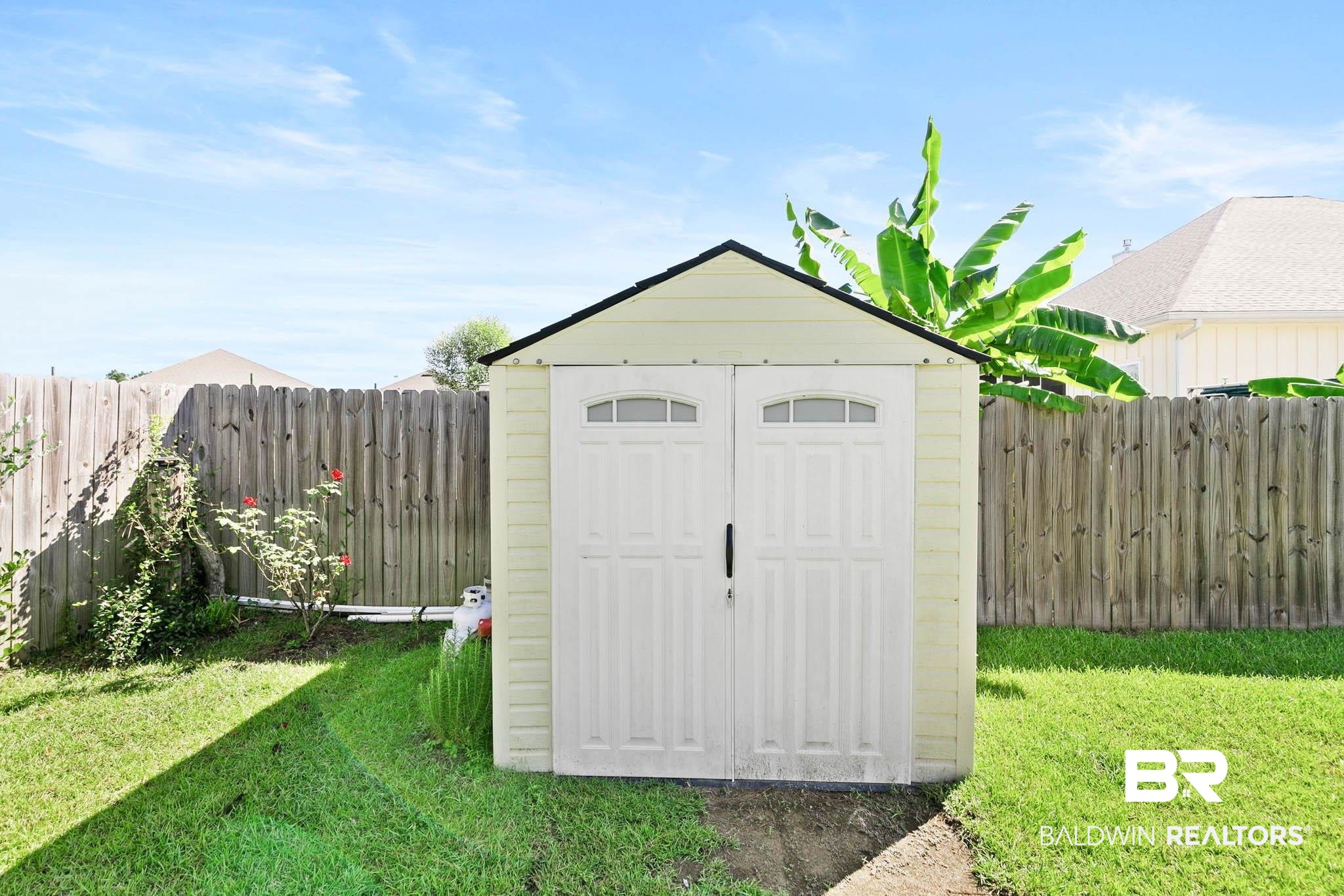 12785 Warbler Street Daphne, AL 36527 - Photo 40 of 53 View of shed featuring a fenced backyard