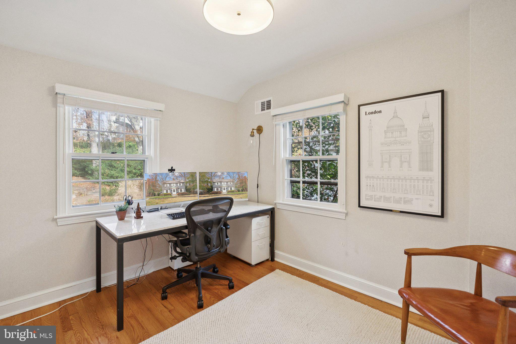 3231 Beech Street Northwest Washington, DC 20015 - Photo 16 of 29 a view of a workspace with furniture and a window