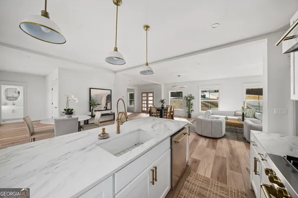 a view of bathroom with wooden floor