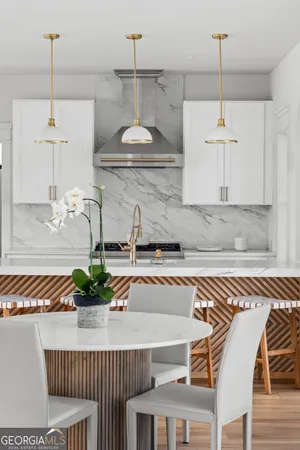 a bathroom with a sink vanity and mirror