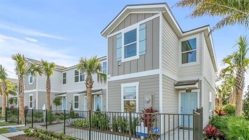 79 Hidden Mdws Road St. Augustine, FL 32095 - Photo 1 of 1 a front view of a house with a yard