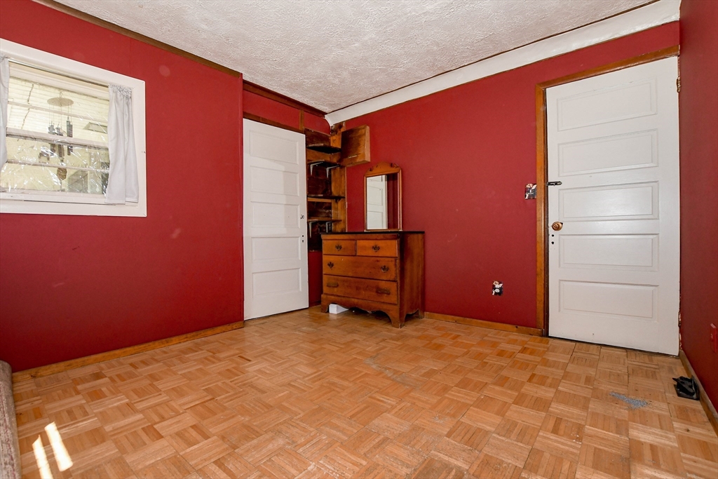 6 Gilbert Way Wareham, MA 02571 - Photo 33 of 41 a view of an empty room with cabinet and a window